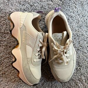 Sorel Women's cream with light grey trim and animal print trim on soles